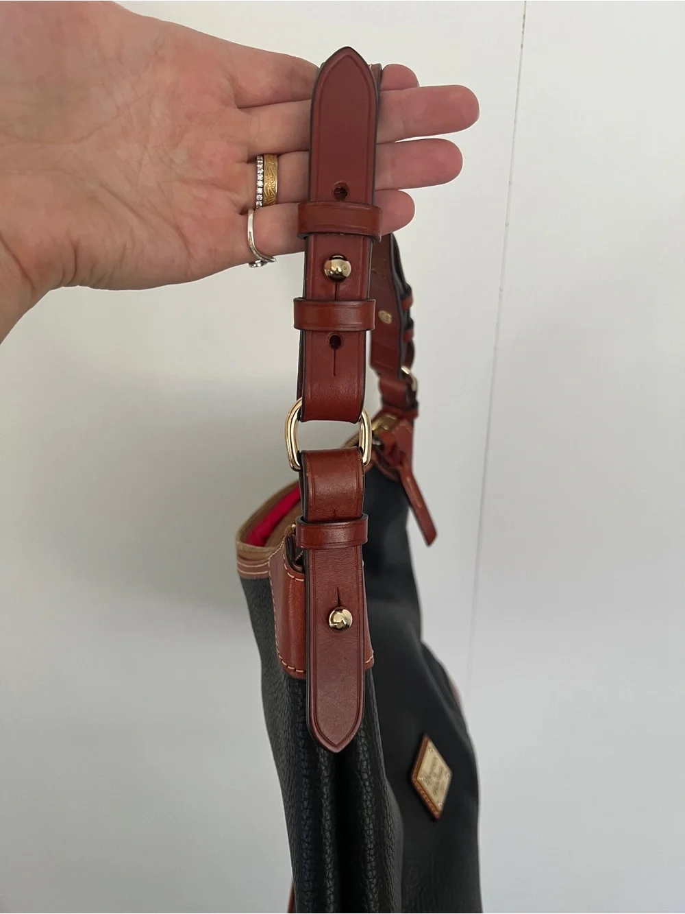 Dooney & Bourke Black Leather Shoulder Bag with Brown Trim